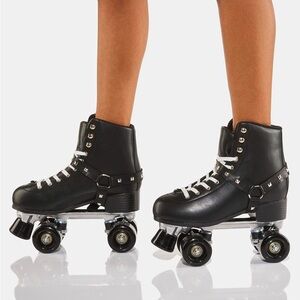cosmic skates - dolls kill - Black Archie studded skates